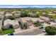 Street view of a home with manicured front yard and a view of the neighborhood and mountains at 9225 E Pine Valley Rd, Scottsdale, AZ 85260