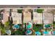 Aerial view of neighborhood showing multiple pools, covered patios, and landscaping at 9225 E Pine Valley Rd, Scottsdale, AZ 85260