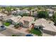 Charming two-story home featuring a tile roof, well-manicured lawn, and attached two-car garage at 9225 E Pine Valley Rd, Scottsdale, AZ 85260