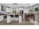 Bright modern kitchen with stainless steel appliances, white cabinets, and butcher block countertops at 9225 E Pine Valley Rd, Scottsdale, AZ 85260