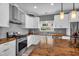 A well-appointed kitchen with butcher block countertops and stainless steel appliances at 9225 E Pine Valley Rd, Scottsdale, AZ 85260