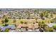 An aerial view of a Primary planned community with mature trees and lush, green landscaping throughout at 11627 S Jokake St, Phoenix, AZ 85044