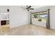 Spacious bedroom featuring a ceiling fan, neutral walls and tile flooring at 11627 S Jokake St, Phoenix, AZ 85044