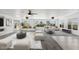 Bright and airy living room featuring oversized windows with views and modern decor at 11627 S Jokake St, Phoenix, AZ 85044