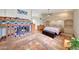 Comfortable bedroom featuring built-in storage, unique fireplace and colorful accents creating a tranquil retreat at 14818 N 10Th St, Phoenix, AZ 85022