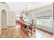 Bright dining room has Saltillo tile floors and a view into the kitchen at 14818 N 10Th St, Phoenix, AZ 85022