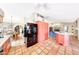 Kitchen with island, adjoining dining room and living area at 14818 N 10Th St, Phoenix, AZ 85022