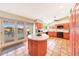 Spacious kitchen with view of the back yard and outdoor pool at 14818 N 10Th St, Phoenix, AZ 85022