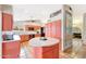 Open kitchen design with center island and Saltillo tile flooring at 14818 N 10Th St, Phoenix, AZ 85022