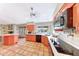 Kitchen with white countertops and view of the yard at 14818 N 10Th St, Phoenix, AZ 85022