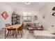 Cozy living room features eclectic decor, warm natural light, and an inviting blend of furniture and decor at 19875 W Badgett Ln, Litchfield Park, AZ 85340