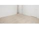Bright bedroom with soft carpeting and a view of the hallway at 37111 W Parador Ln, Maricopa, AZ 85138