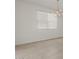 Bright dining area with tile flooring, a window and an elegant chandelier at 37151 W Parador Ln, Maricopa, AZ 85138
