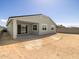 The home showcases a rear patio and a spacious backyard, offering space for outdoor living at 4032 S 176Th Dr, Goodyear, AZ 85338