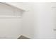 Walk-in closet offering ample storage with a rod, perfect for organizing clothes and accessories at 4032 S 176Th Dr, Goodyear, AZ 85338
