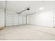 Spacious garage with an automatic door, plenty of room for parking and storage at 4032 S 176Th Dr, Goodyear, AZ 85338