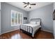 Bedroom with natural light showcasing its comfortable features and relaxing ambiance at 5744 E Hedgehog Pl, Scottsdale, AZ 85266