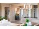 Inviting entryway with tile flooring, stylish lighting, and open layout to living spaces at 5744 E Hedgehog Pl, Scottsdale, AZ 85266