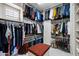 Well-organized walk-in closet providing ample storage with custom shelving and hanging racks at 5744 E Hedgehog Pl, Scottsdale, AZ 85266
