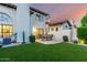 Private backyard featuring manicured lawn, stucco walls, and patio perfect for outdoor living at 11011 N 92Nd St # 1010, Scottsdale, AZ 85260