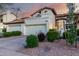 Beautiful home featuring two-car garage, desert landscaping, and a Spanish tile roof at 11011 N 92Nd St # 1010, Scottsdale, AZ 85260