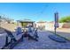 Spacious backyard with brick patio, gazebo, and seating area perfect for entertaining at 14912 W Lamoille Dr, Surprise, AZ 85374