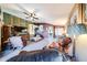 Spacious living room with hardwood accents, tile flooring and comfortable seating arrangements at 14912 W Lamoille Dr, Surprise, AZ 85374