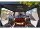 Comfortable outdoor patio under a gazebo provides an idyllic location for entertaining guests at 14912 W Lamoille Dr, Surprise, AZ 85374