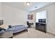 Cozy bedroom with a bed, desk, and dresser for storage and study at 16140 W Sierra St, Surprise, AZ 85379