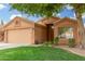 Charming single-story home featuring a well-maintained lawn and a neutral-toned exterior at 1905 E Palomino Dr, Gilbert, AZ 85296