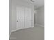 Clean bedroom with plush carpet, ample closet space, and an abundance of natural light at 20209 W San Miguel Ave, Litchfield Park, AZ 85340