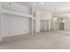 Bright living room with carpet flooring, ceiling fan, and chandelier at 2039 W Ronald Rd, Phoenix, AZ 85029
