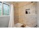 Bathroom with tiled tub and shower, white shower curtain, and textured glass window at 2726 E Fairmount Ave, Phoenix, AZ 85016