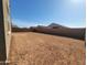 Large, undeveloped backyard awaiting your personal touch and landscaping ideas at 322 S San Christo Ln, Casa Grande, AZ 85194