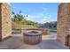 View of the community firepit with desert landscaping and mountain views at 3466 E Hazeltine Way, Queen Creek, AZ 85142