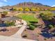 Community park with shelter, picnic tables and walking path surrounded by desert landscaping at 3466 E Hazeltine Way, Queen Creek, AZ 85142