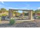 Charming community space featuring stone pillars, picnic tables, and a built-in grill for outdoor gatherings at 3466 E Hazeltine Way, Queen Creek, AZ 85142
