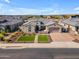 Stunning single-story home with desert landscaping and a paver driveway leading to a two-car garage at 3466 E Hazeltine Way, Queen Creek, AZ 85142