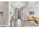 Elegant foyer featuring tile flooring, neutral walls, and an ornate front door at 3466 E Hazeltine Way, Queen Creek, AZ 85142