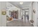 Open-concept living area featuring hardwood floors, view to dining, and neutral color palette at 3466 E Hazeltine Way, Queen Creek, AZ 85142