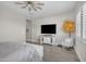 Calm bedroom with stylish decor, ceiling fan, and tiled floors at 3466 E Hazeltine Way, Queen Creek, AZ 85142