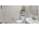 Well-lit powder room with updated fixtures, a stylish sink, and neutral decor at 3466 E Hazeltine Way, Queen Creek, AZ 85142