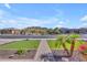 Picturesque street view featuring desert landscape with mountain views and well-maintained yards at 3466 E Hazeltine Way, Queen Creek, AZ 85142