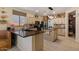 Well-appointed kitchen features a central island, modern appliances, and a walk-in pantry, maximizing space and functionality at 4046 E Laurel Ave, Gilbert, AZ 85234