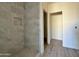 Bathroom featuring tile shower and flooring, combining style and functionality for a relaxing experience at 4160 N Tamarax Dr, Eloy, AZ 85131