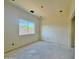 Spacious bedroom with a window providing natural light, perfect for creating a relaxing retreat at 4160 N Tamarax Dr, Eloy, AZ 85131
