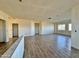 Open-concept living area showcasing neutral walls, tile floors, and ample space for a modern design at 4160 N Tamarax Dr, Eloy, AZ 85131