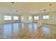 Bright living room featuring neutral walls, tile flooring, and windows providing natural light at 4160 N Tamarax Dr, Eloy, AZ 85131