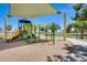 Community playground area offering covered play structures with slides, stairs, and climbing equipment for entertainment at 11822 W Softwind Dr, Sun City, AZ 85373