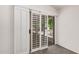 A view of glass sliding doors leading to the back yard at 15460 W Amelia Dr, Goodyear, AZ 85395